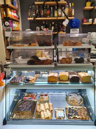 Fotografia tomada fuera de D'gusta Bakery & café - Pastelería en Portomarín, Lugo