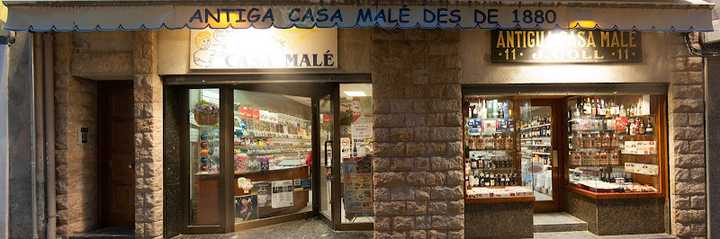 Fotografia tomada fuera de Antiga Casa Male - Tienda de alimentación en Santa Coloma de Farners, Girona